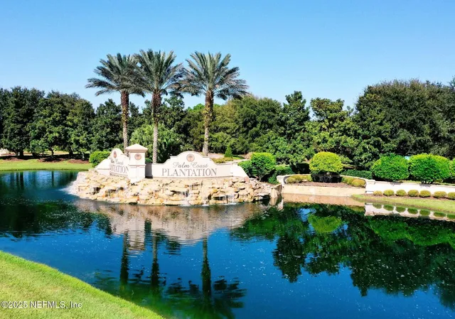 a view of yard with swimming pool and outdoor seating