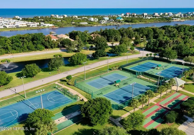 an aerial view of a pool patio patio and outdoor seating
