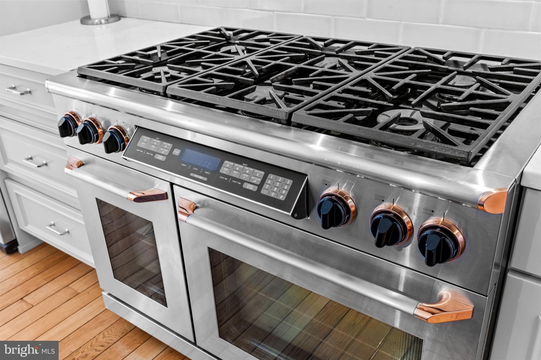 2331 Boston Street, Unit 1 Baltimore, MD 21224 - Photo 27 of 74 a close view of stove top oven