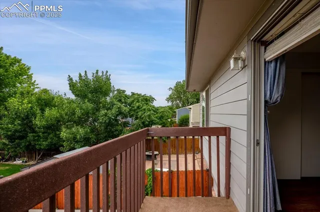 a view of a balcony with an outdoor space