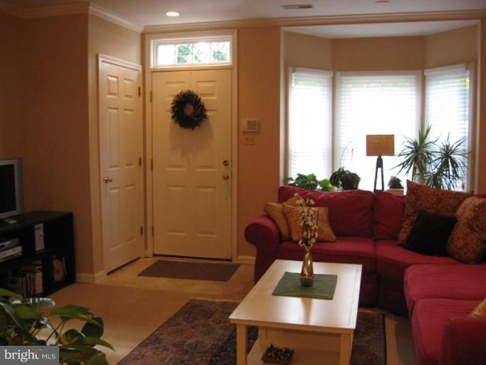 512 Tschiffely Square Road Gaithersburg, MD 20878 - Photo 8 of 17 The Living Room with a view of the Entrance Door