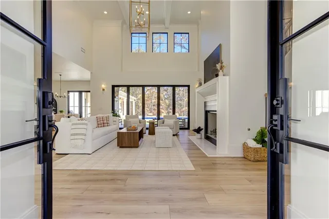 a kitchen with stainless steel appliances white cabinets and a stove