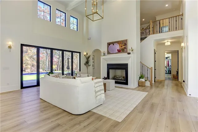 a kitchen with stainless steel appliances cabinets and a window