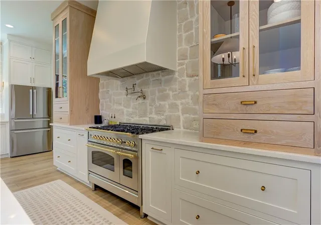 a bedroom with a bed and a potted plant