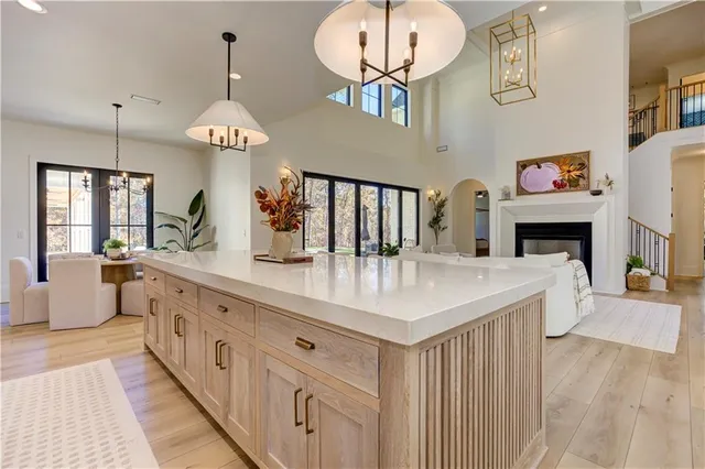 a bathroom with a shower curtain a sink and a toilet