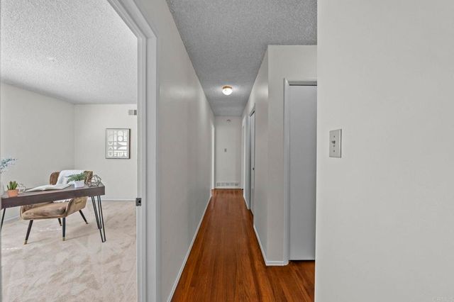 a workspace with furniture and window