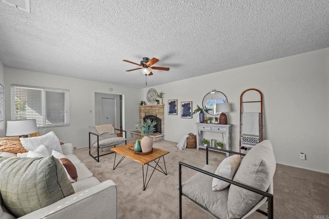 a view of a hallway and interior of the house