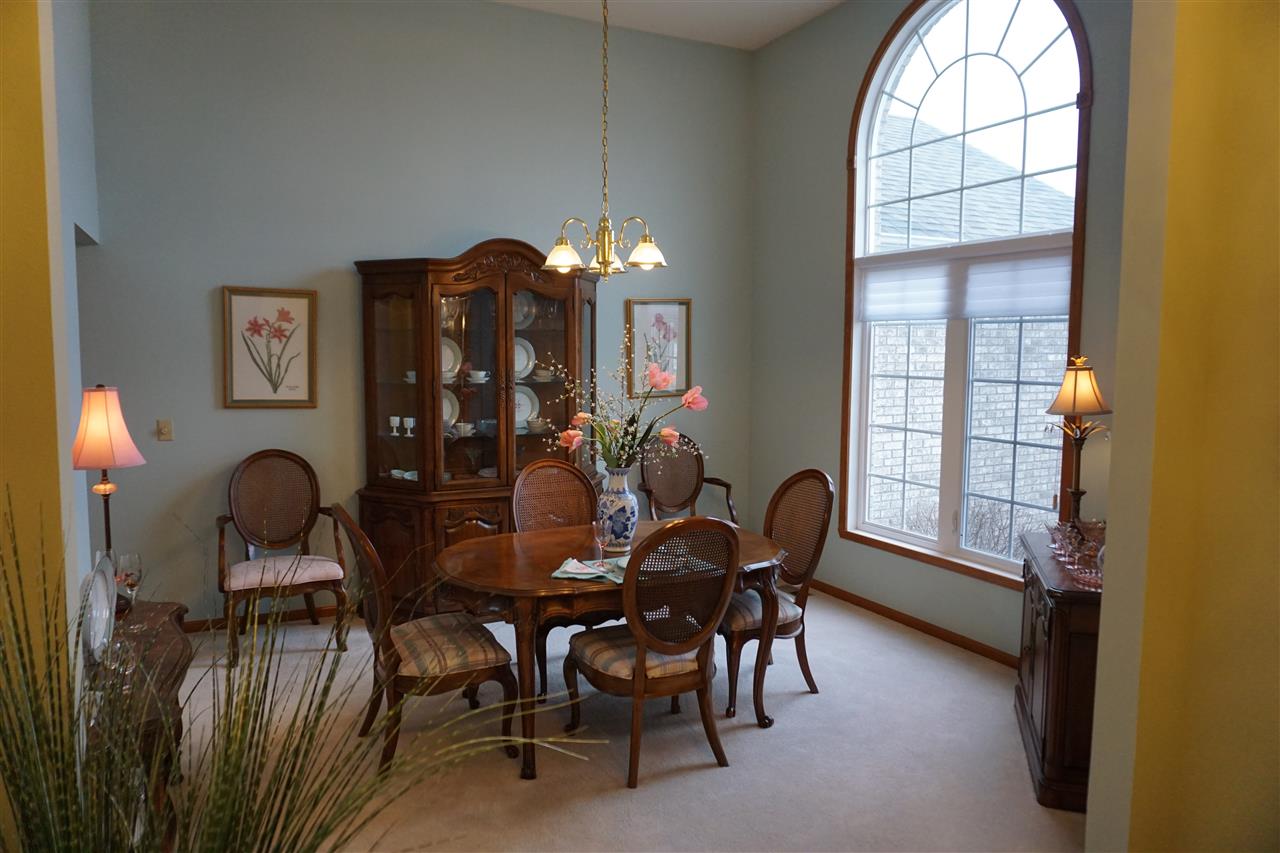 11123 Chicory Ridge Way Roscoe, IL 61073 - Photo 4 of 23 a dining room with furniture and window