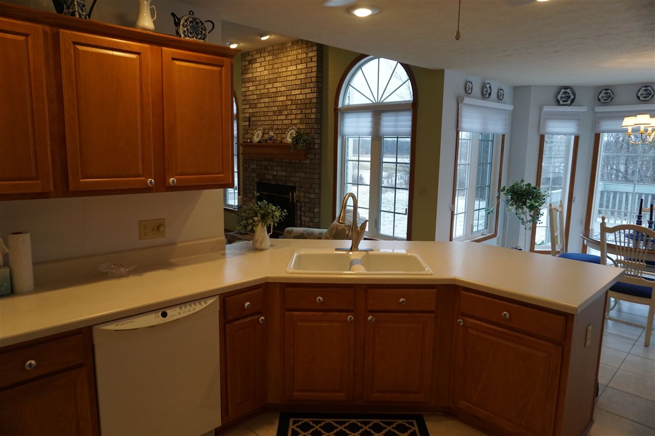 11123 Chicory Ridge Way Roscoe, IL 61073 - Photo 7 of 23 a kitchen with a sink and cabinets