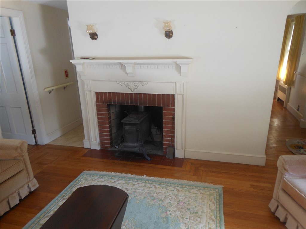 6 James A Potter Road Scituate, RI 02857 - Photo 8 of 44 FIREPLACE W/WOOD BURNING STOVE IN LIVING ROOM