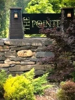a view of swimming pool with outdoor seating