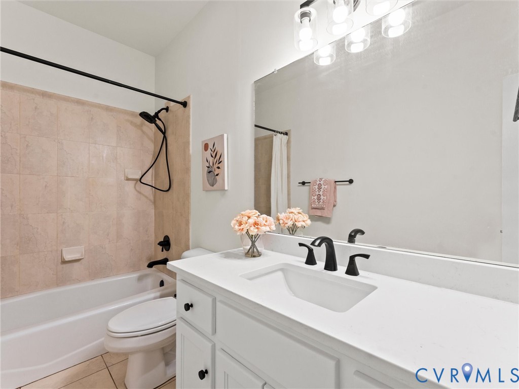 12 Henderson Road New Canton, VA 23123 - Photo 25 of 49 White vanity with black hardware, integrated recta