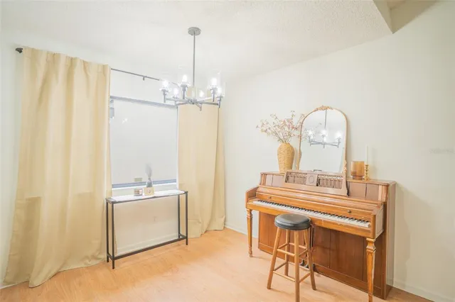 a room with a sink cabinets and appliances
