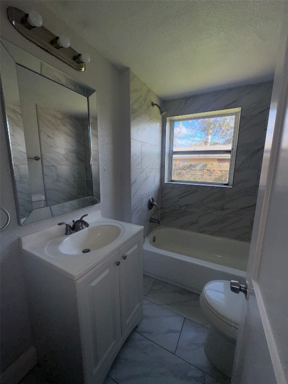 512 Rice Street Angleton, TX 77515 - Photo 10 of 12 a bathroom with a tub sink and mirror