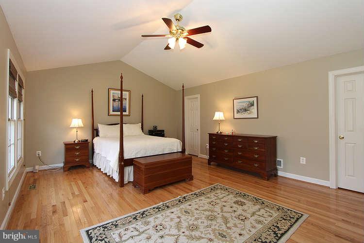4619 Brightwood Road Olney, MD 20832 - Photo 18 of 30 Master bedroom with hardwood floors