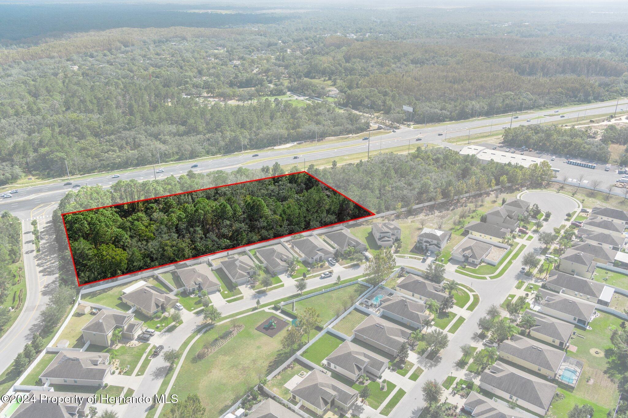 18119 Us-19 Hudson, FL 34667 - Photo 12 of 47 a view of balcony with wooden floor
