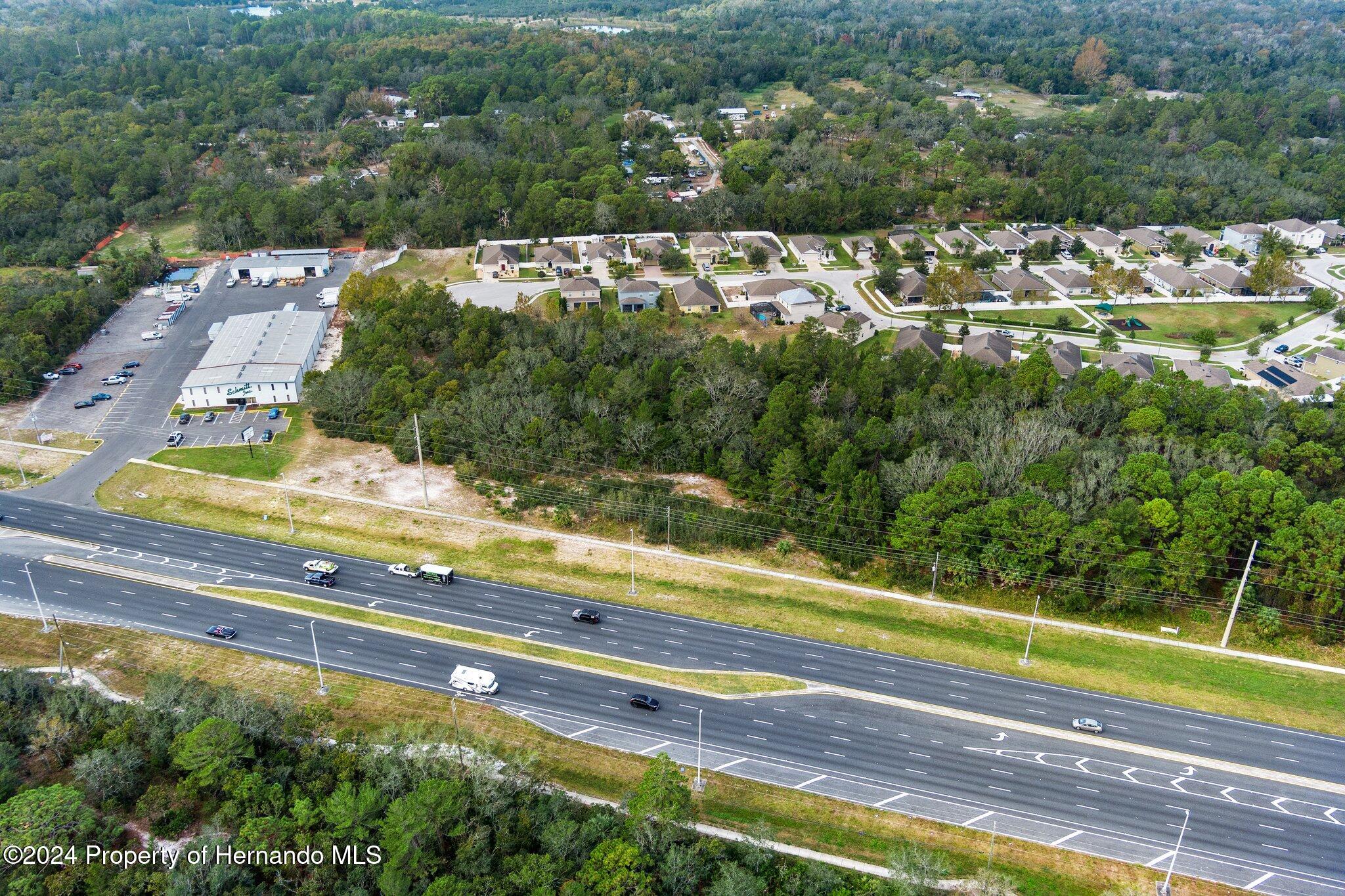 18119 Us-19 Hudson, FL 34667 - Photo 16 of 47 a view of a tennis court