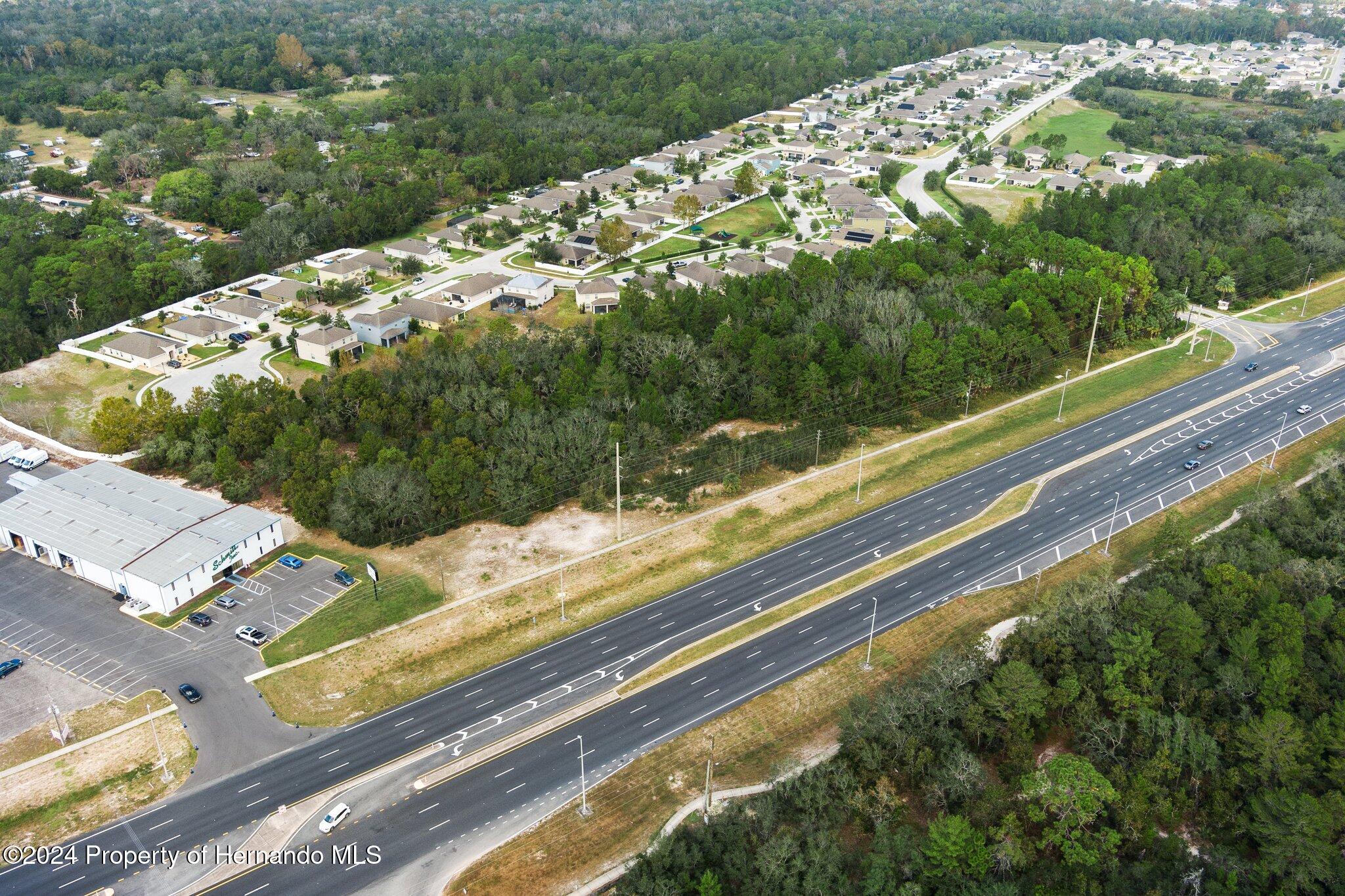18119 Us-19 Hudson, FL 34667 - Photo 21 of 47 a view of a yard from a balcony