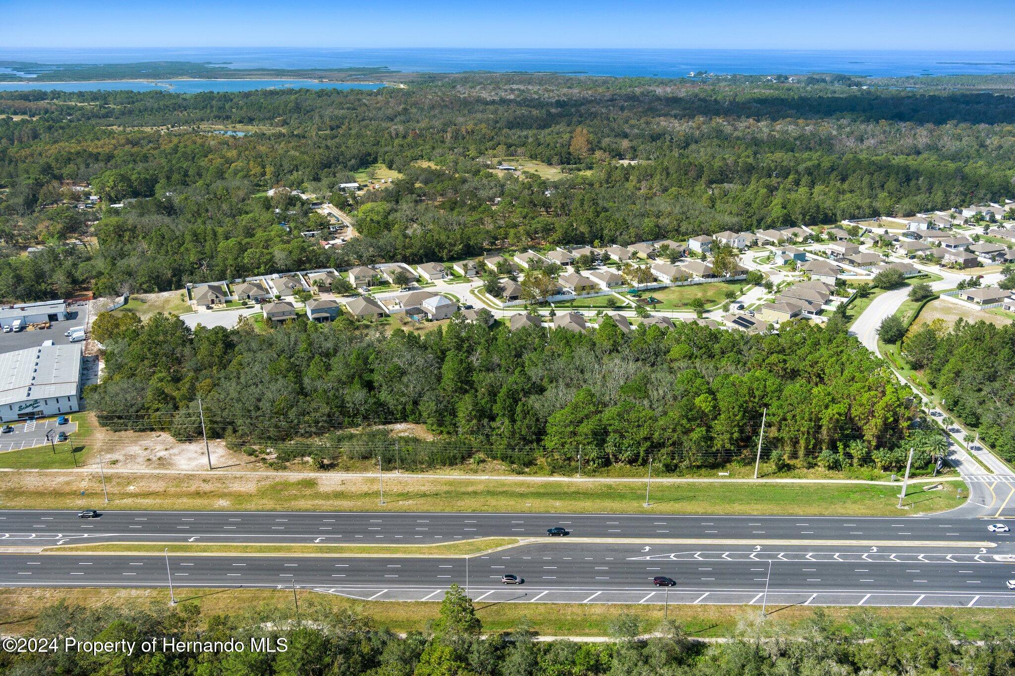 18119 Us-19 Hudson, FL 34667 - Photo 26 of 47 a view of a yard with a house