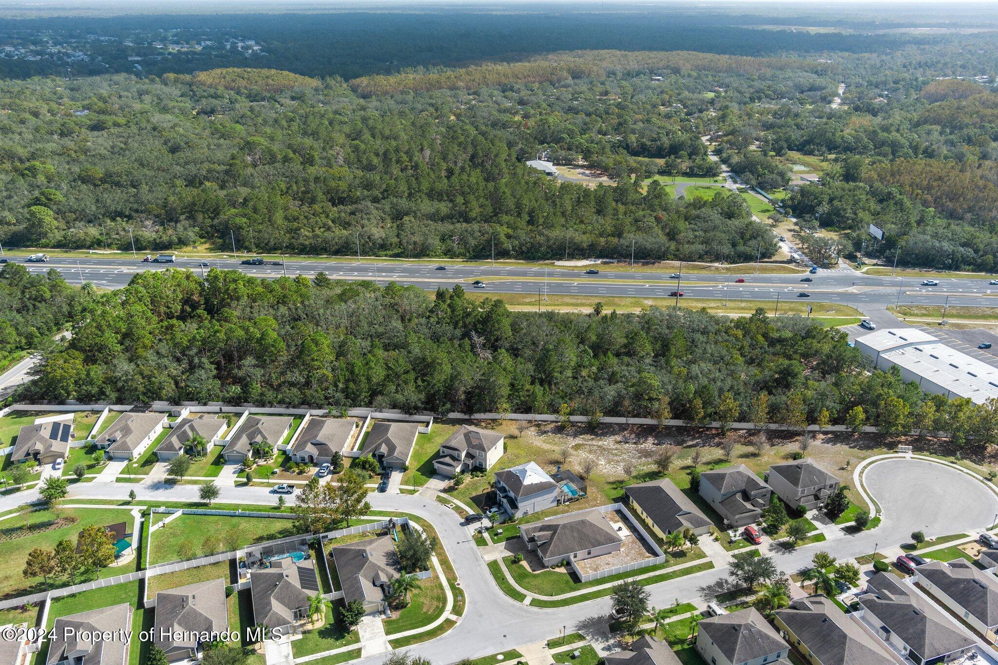 18119 Us-19 Hudson, FL 34667 - Photo 28 of 47 a view of a lake with a yard