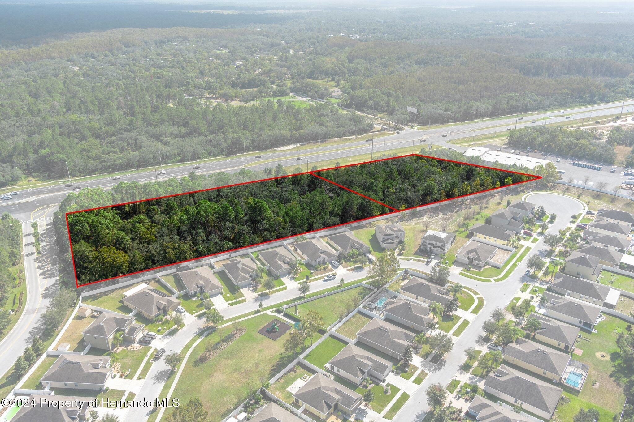 18119 Us-19 Hudson, FL 34667 - Photo 29 of 47 a view of balcony with wooden floor