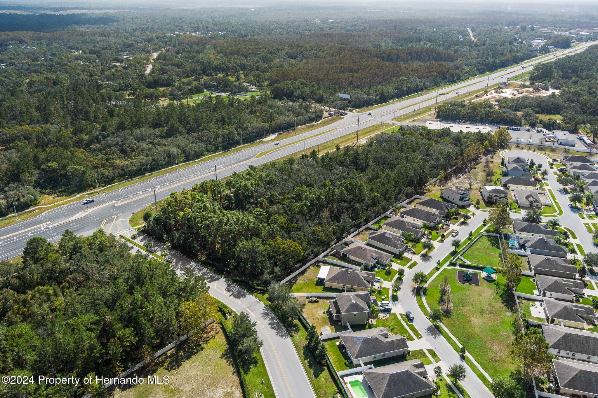 18119 Us-19 Hudson, FL 34667 - Photo 31 of 47 a view of a city from a balcony with outdoor space