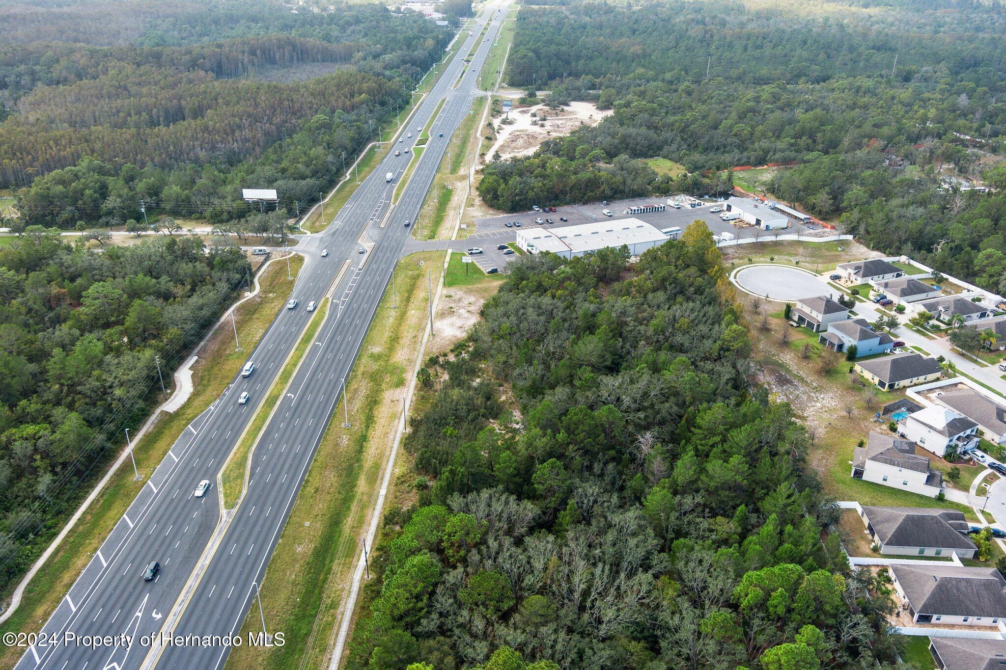 18119 Us-19 Hudson, FL 34667 - Photo 42 of 47 a view of a yard with a balcony