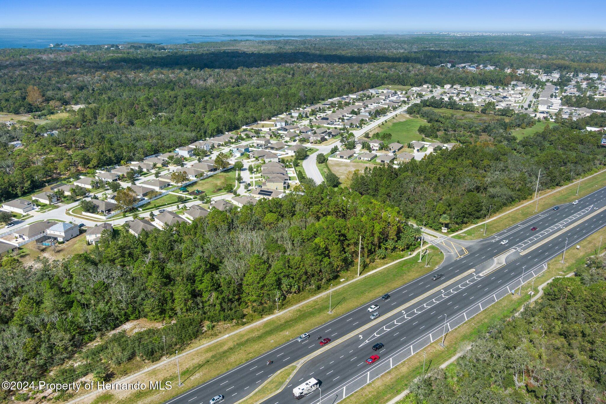 18119 Us-19 Hudson, FL 34667 - Photo 5 of 47 a view of a garden from a balcony