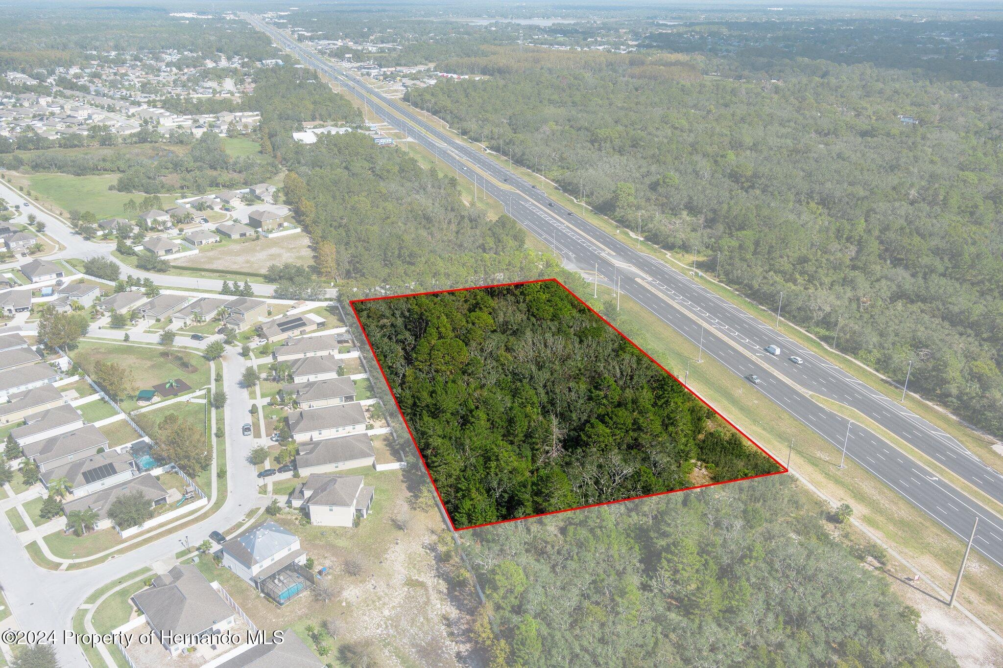 18119 Us-19 Hudson, FL 34667 - Photo 6 of 47 a view of balcony with wooden floor