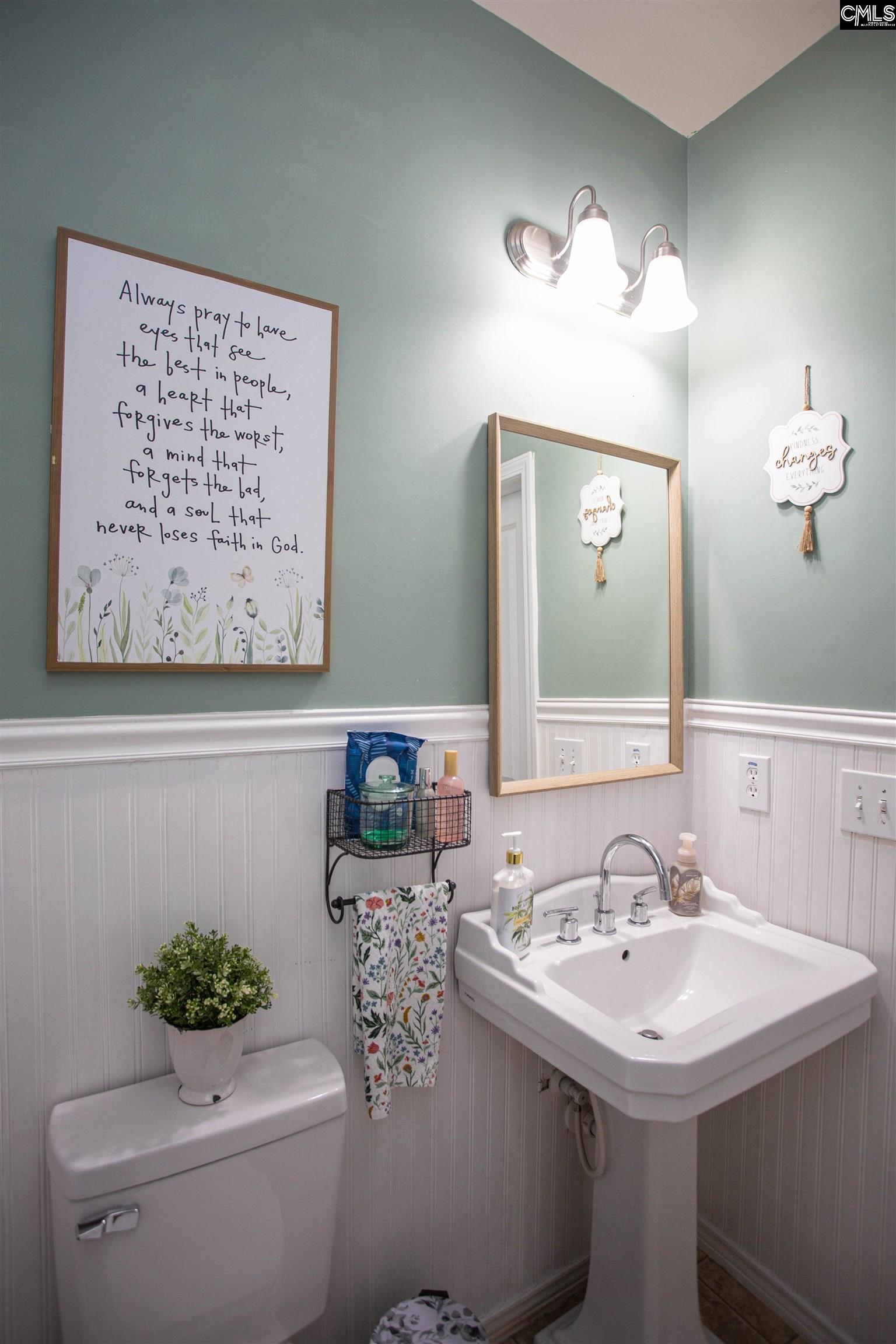 7 Templand Court Elgin, SC 29045 - Photo 24 of 47 a bathroom with a sink and a mirror