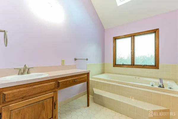a bathroom with a sink and a bathtub