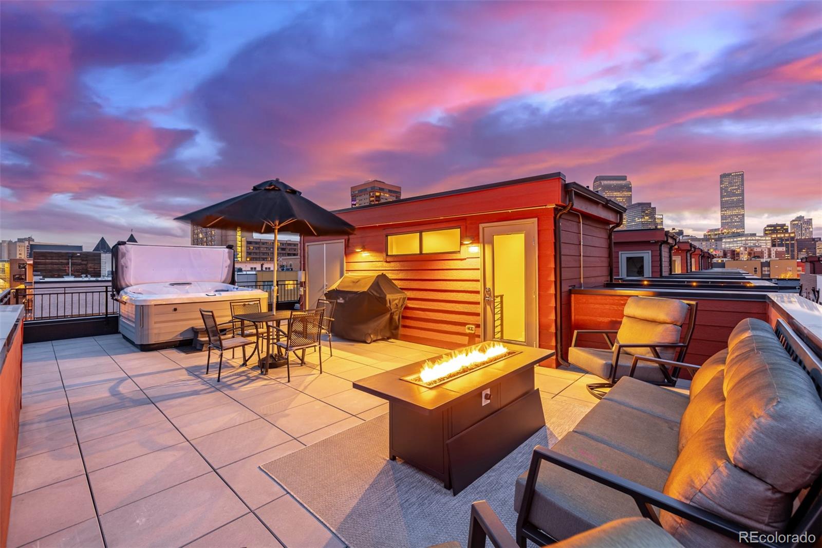 2350 Tremont Place, Unit 13 Denver, CO 80205 - Photo 33 of 41 a view of a terrace with sitting area