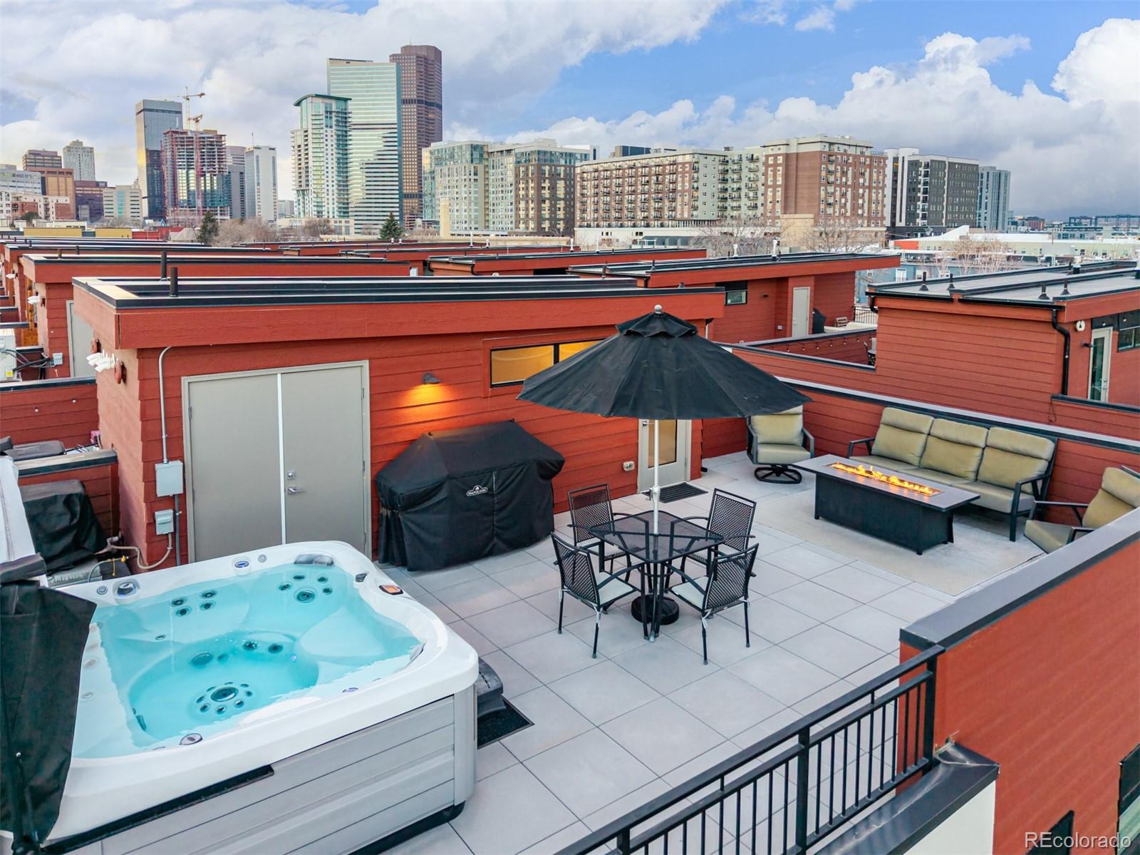 2350 Tremont Place, Unit 13 Denver, CO 80205 - Photo 5 of 41 a outdoor view with a sitting space