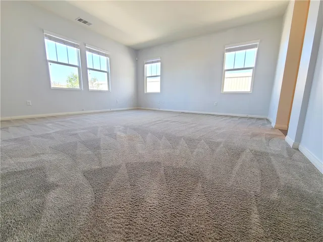 a view of a windows in an empty room