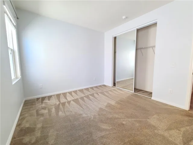 an empty room with a natural light