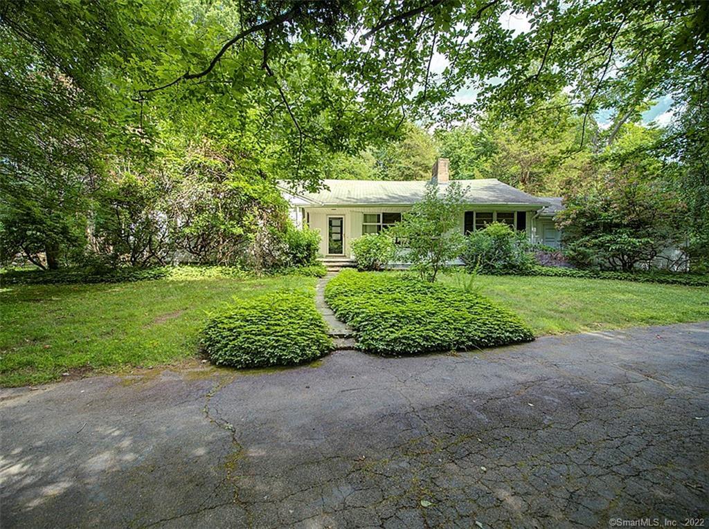 81 Ford Road Woodbridge, CT 06525 - Photo 1 of 1 a view of a garden with a house