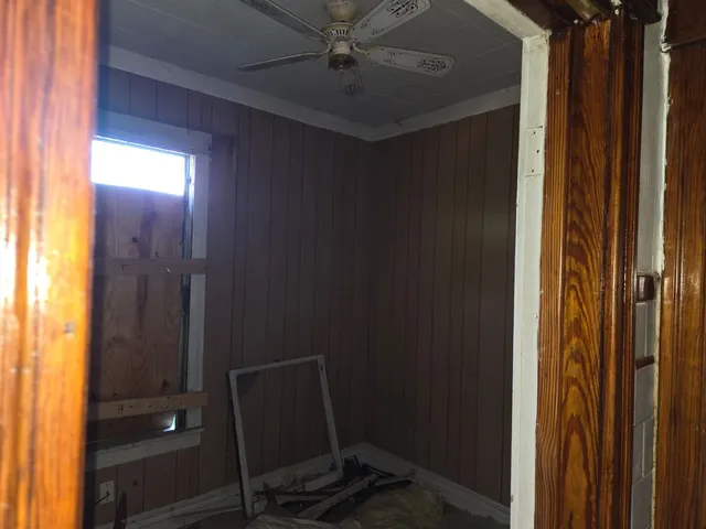 a view of room with a hallway