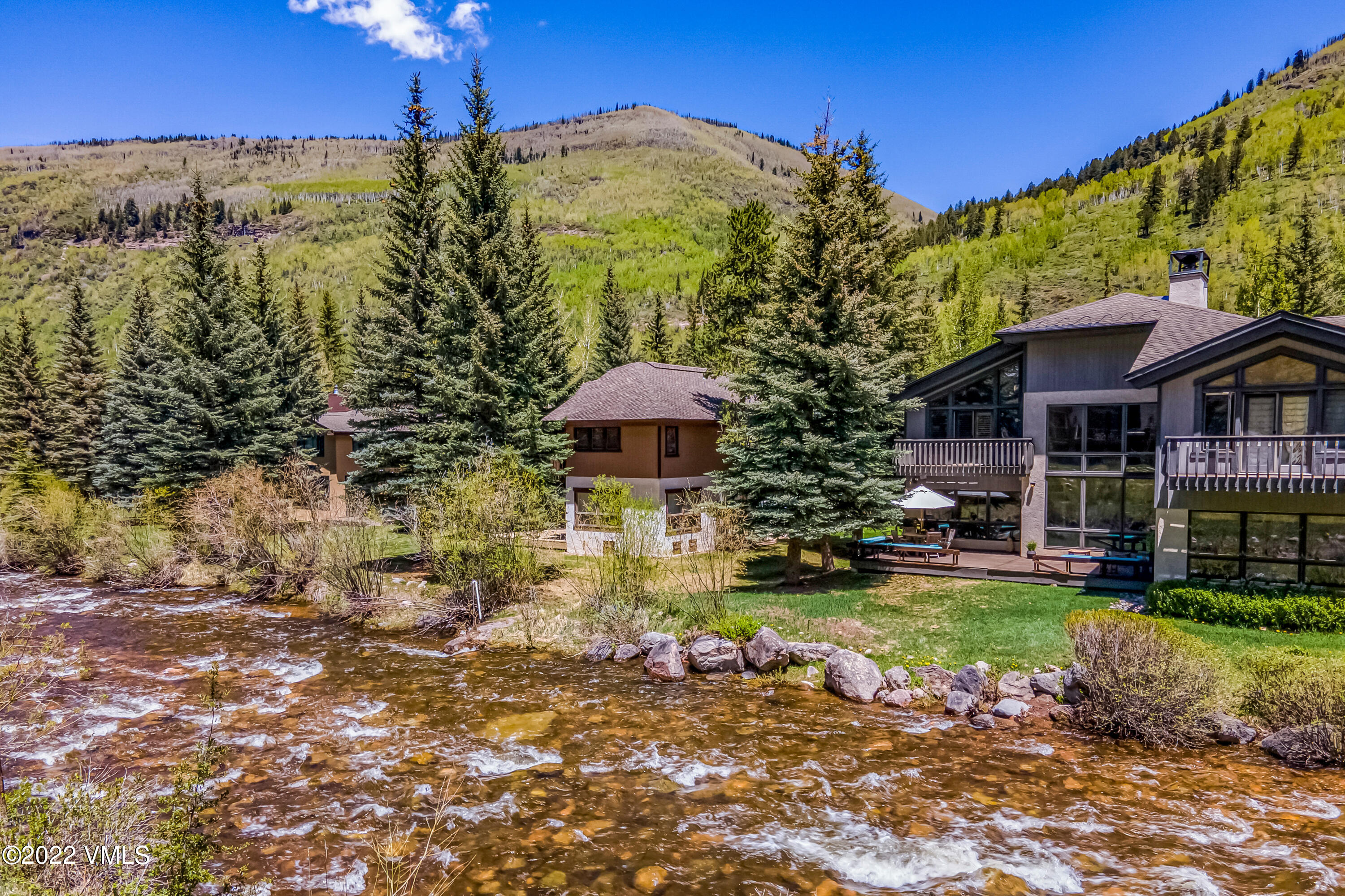 3984 Big Horn Road, Unit A Vail, CO 81657 - Photo 1 of 50 a view of a garden with a house