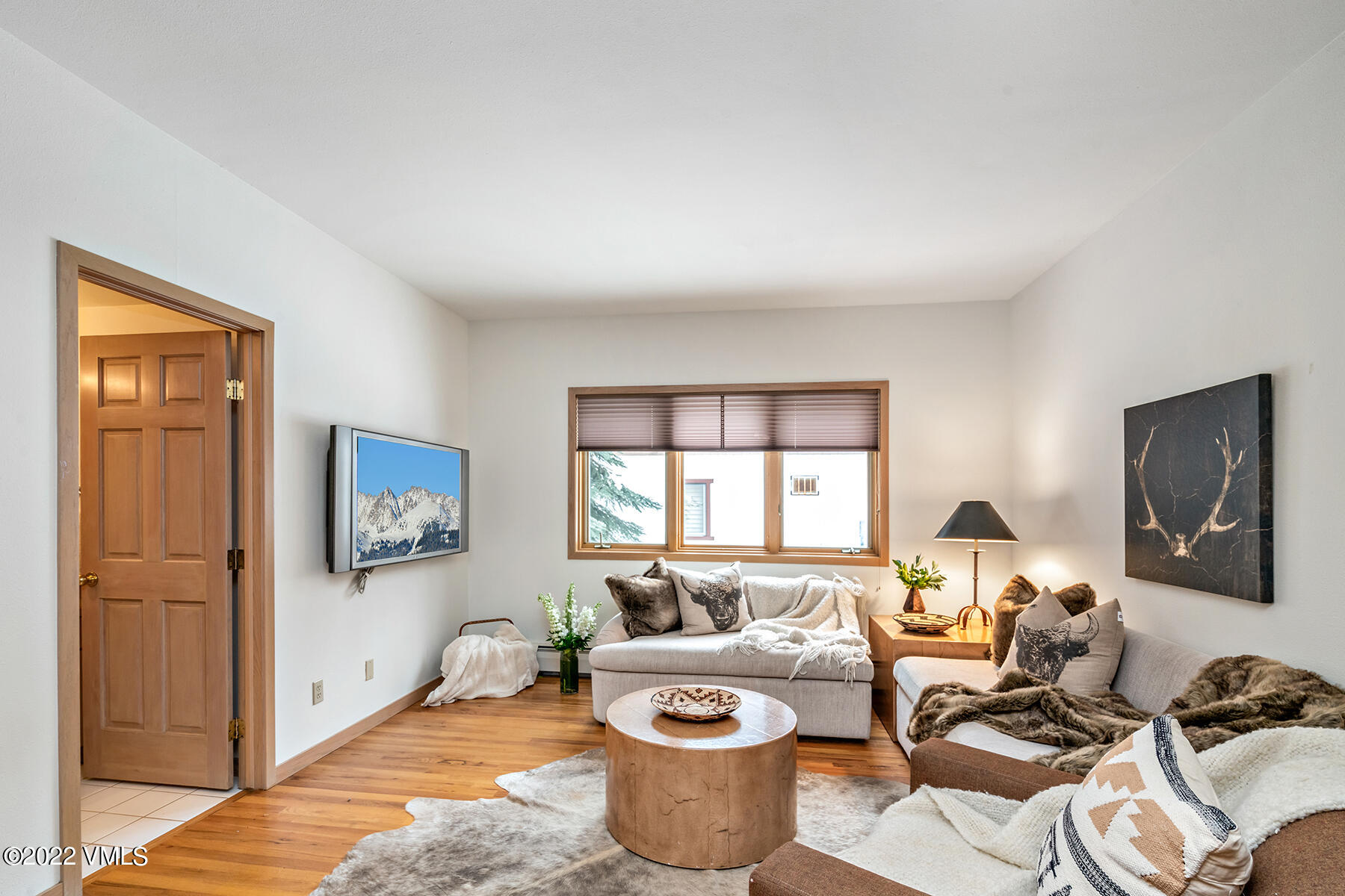 3984 Big Horn Road, Unit A Vail, CO 81657 - Photo 24 of 50 a living room with furniture and a window