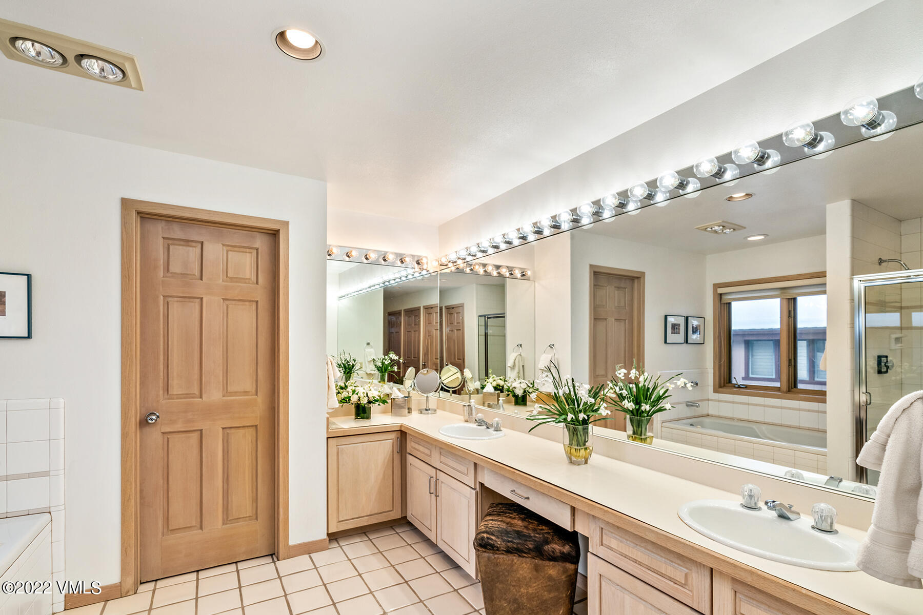 3984 Big Horn Road, Unit A Vail, CO 81657 - Photo 32 of 50 a bathroom with a sink double vanity and a mirror