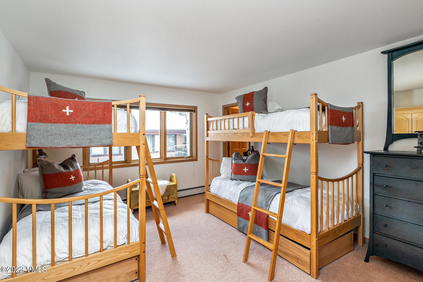 3984 Big Horn Road, Unit A Vail, CO 81657 - Photo 37 of 50 a bedroom with furniture and a window