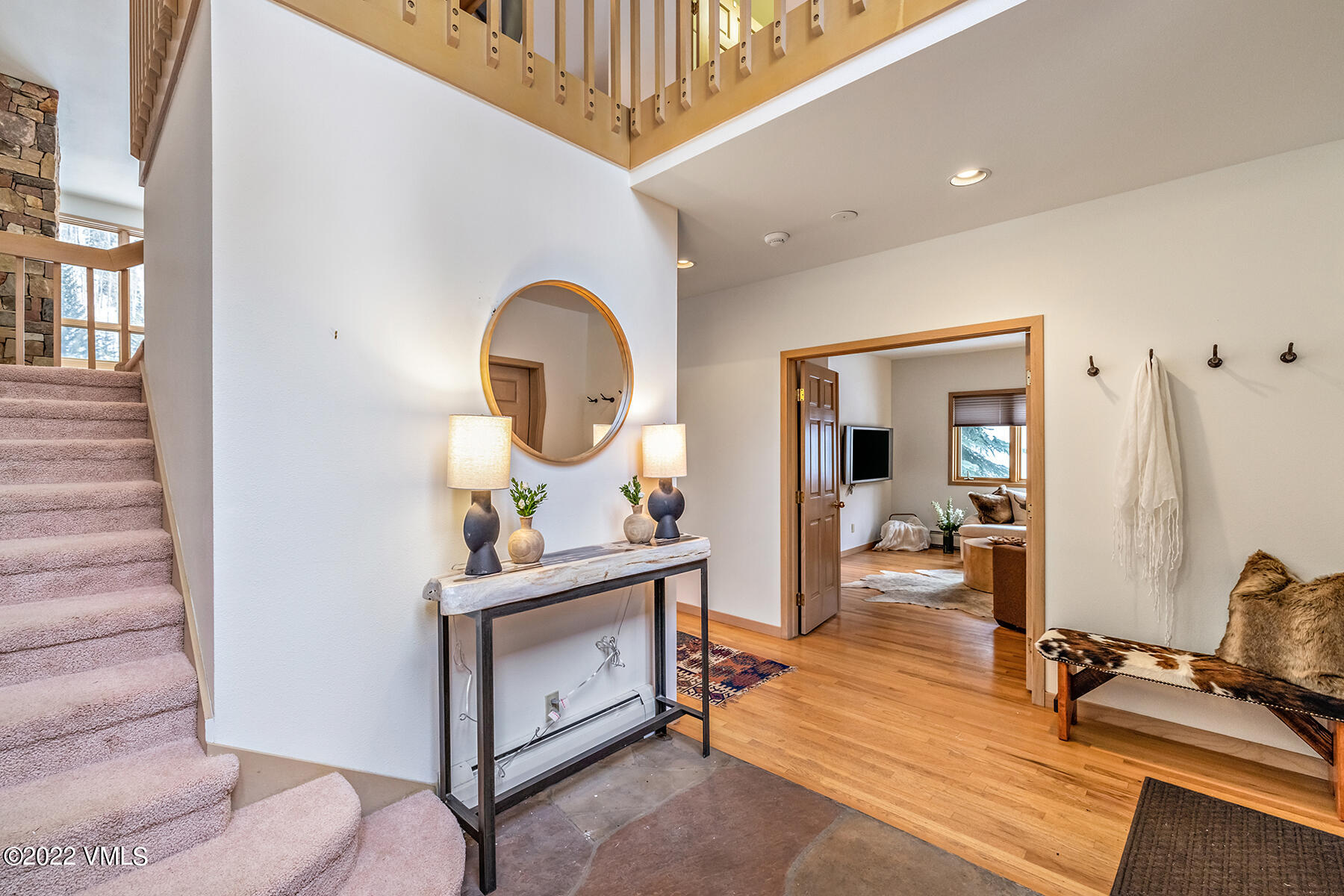 3984 Big Horn Road, Unit A Vail, CO 81657 - Photo 39 of 50 a room with furniture and wooden floor