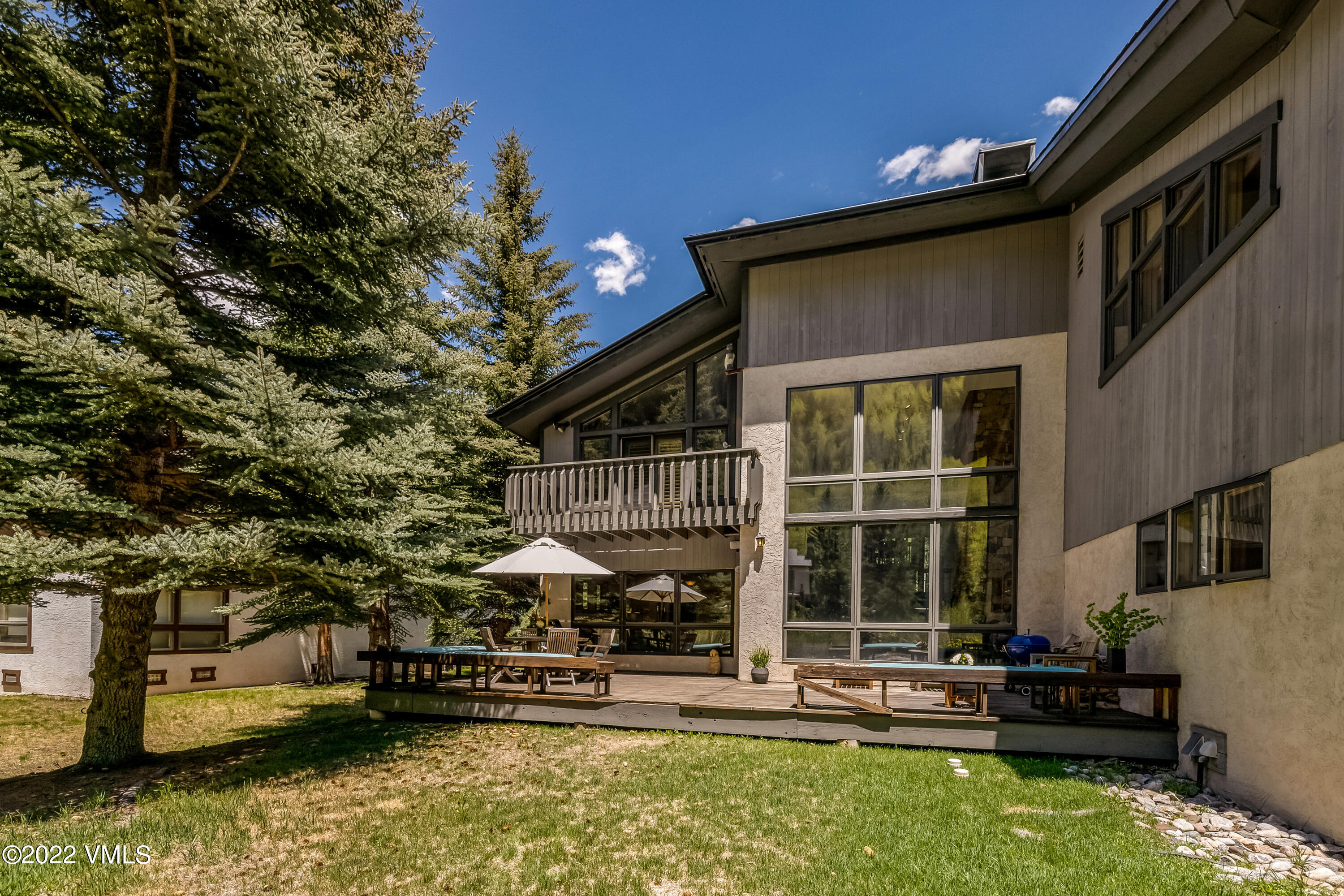 3984 Big Horn Road, Unit A Vail, CO 81657 - Photo 4 of 50 a front view of a house with a yard