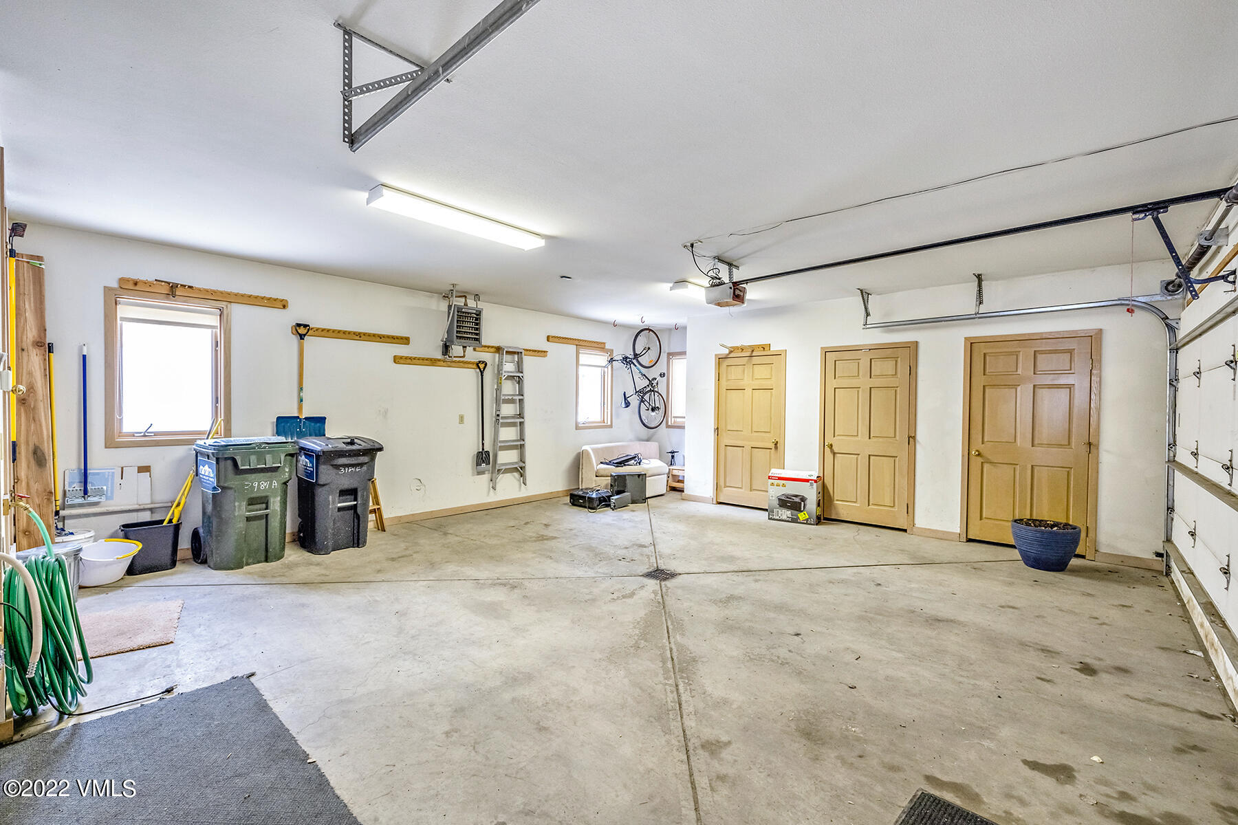 3984 Big Horn Road, Unit A Vail, CO 81657 - Photo 47 of 50 a large bedroom with furniture and large window