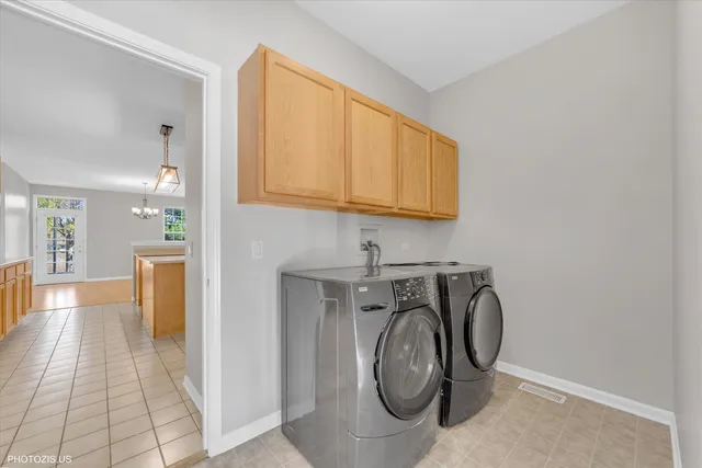 a bathroom with a sink mirror and toilet