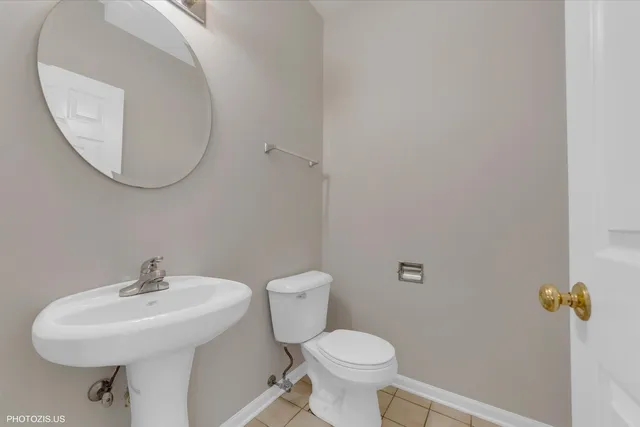 a view of staircase with white walls and railing