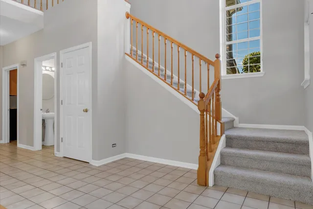 a view of a hallway with windows