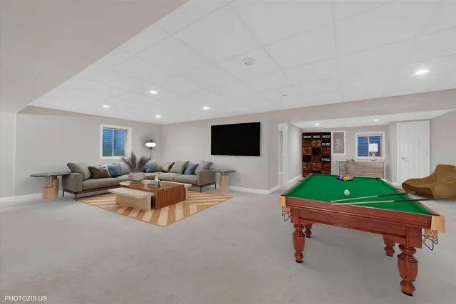 an empty room with a empty space and windows