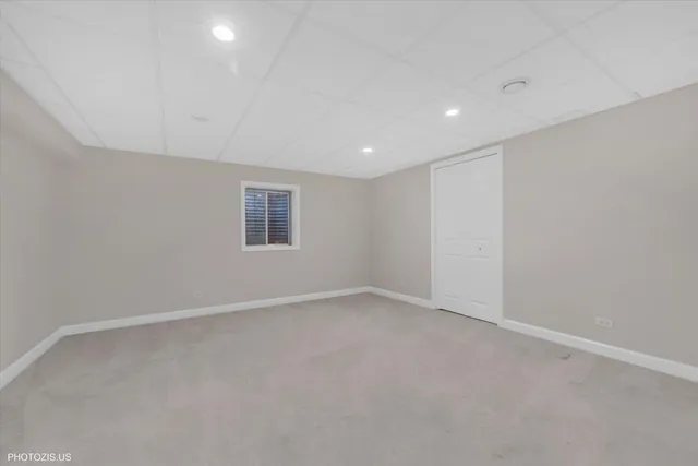 a view of a backyard with sitting area