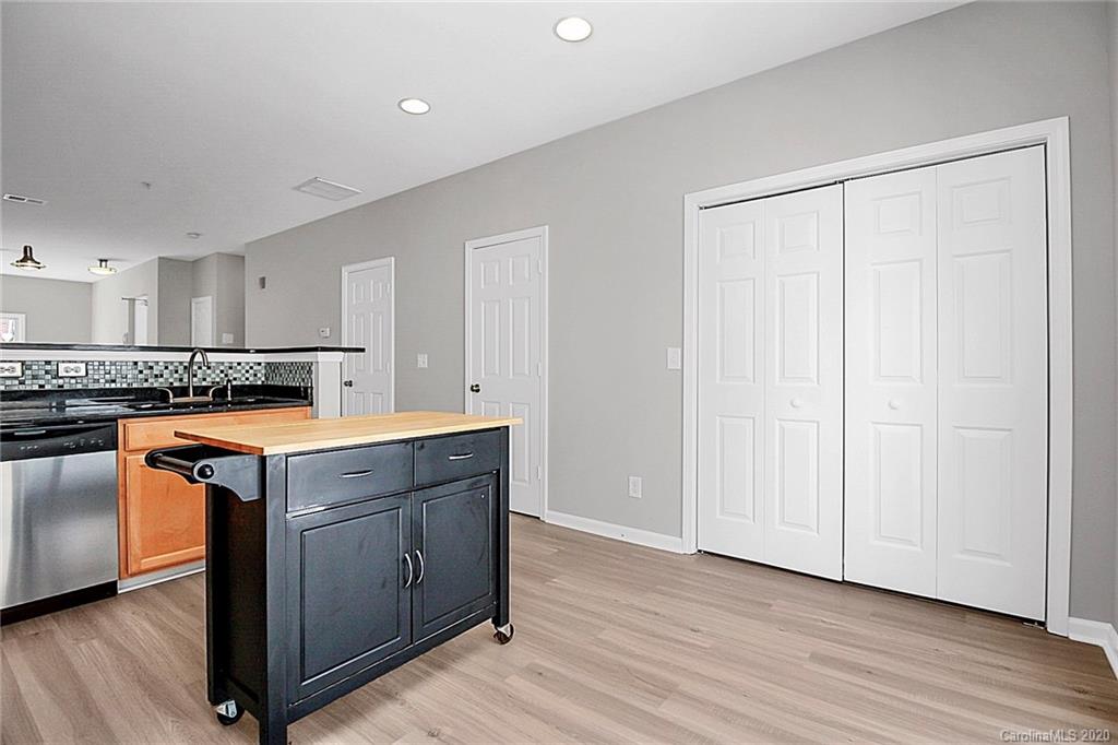 648 Raphael Place Charlotte, NC 28205 - Photo 25 of 48 a view of a kitchen with wooden floor